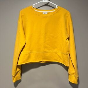 mustard colored cropped crewneck
